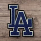LA embroidered patch in blue and white, perfect for jackets and bags.